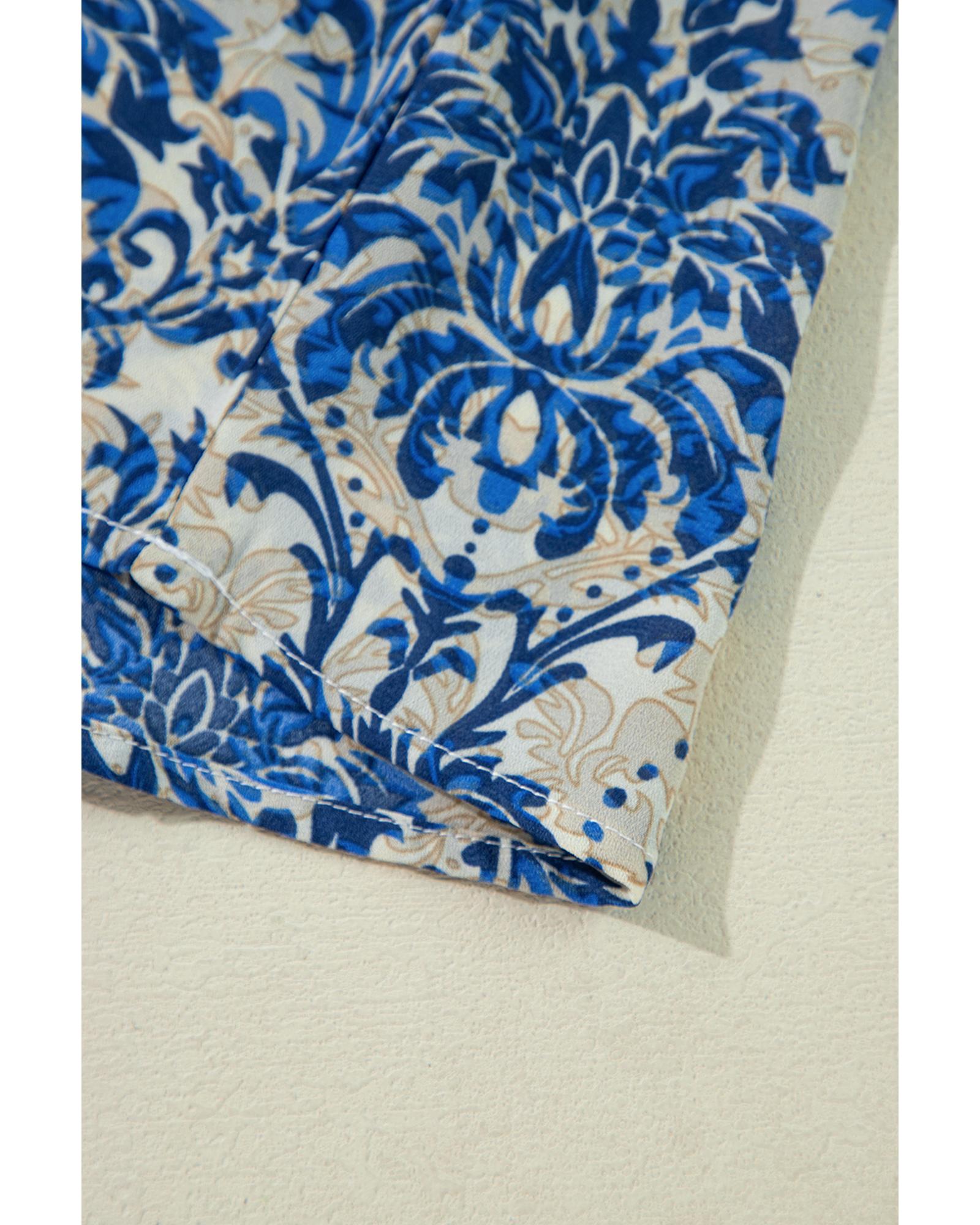 V539-AZEXPL25128553-P520-2X-202508310900-00 Blue Plus Size Ethnic Printed 3/4 Sleeve V Neck Loose Blouse - 2X - Image 1