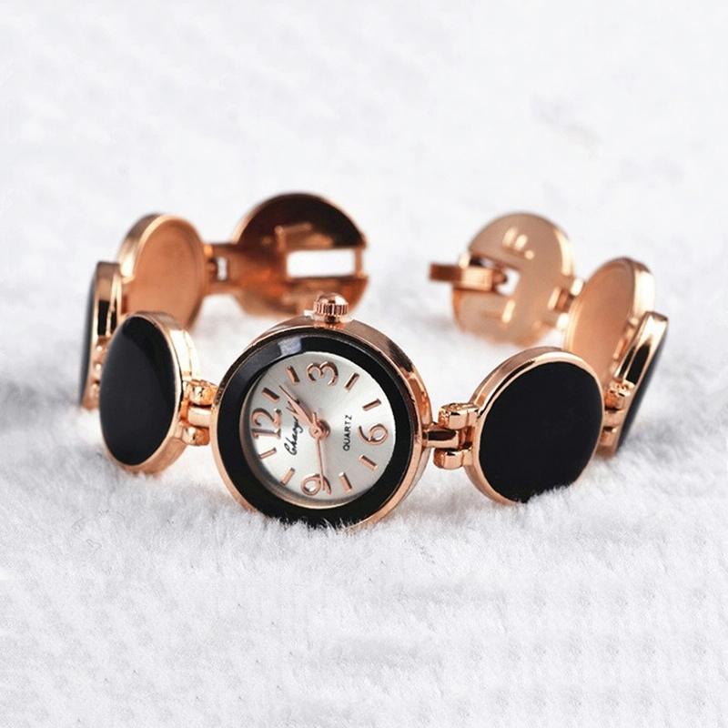 V562-A106018070DBT-202502211925-00 Black Round Dial Bracelet Quartz Wristwatch for Women - Image 1
