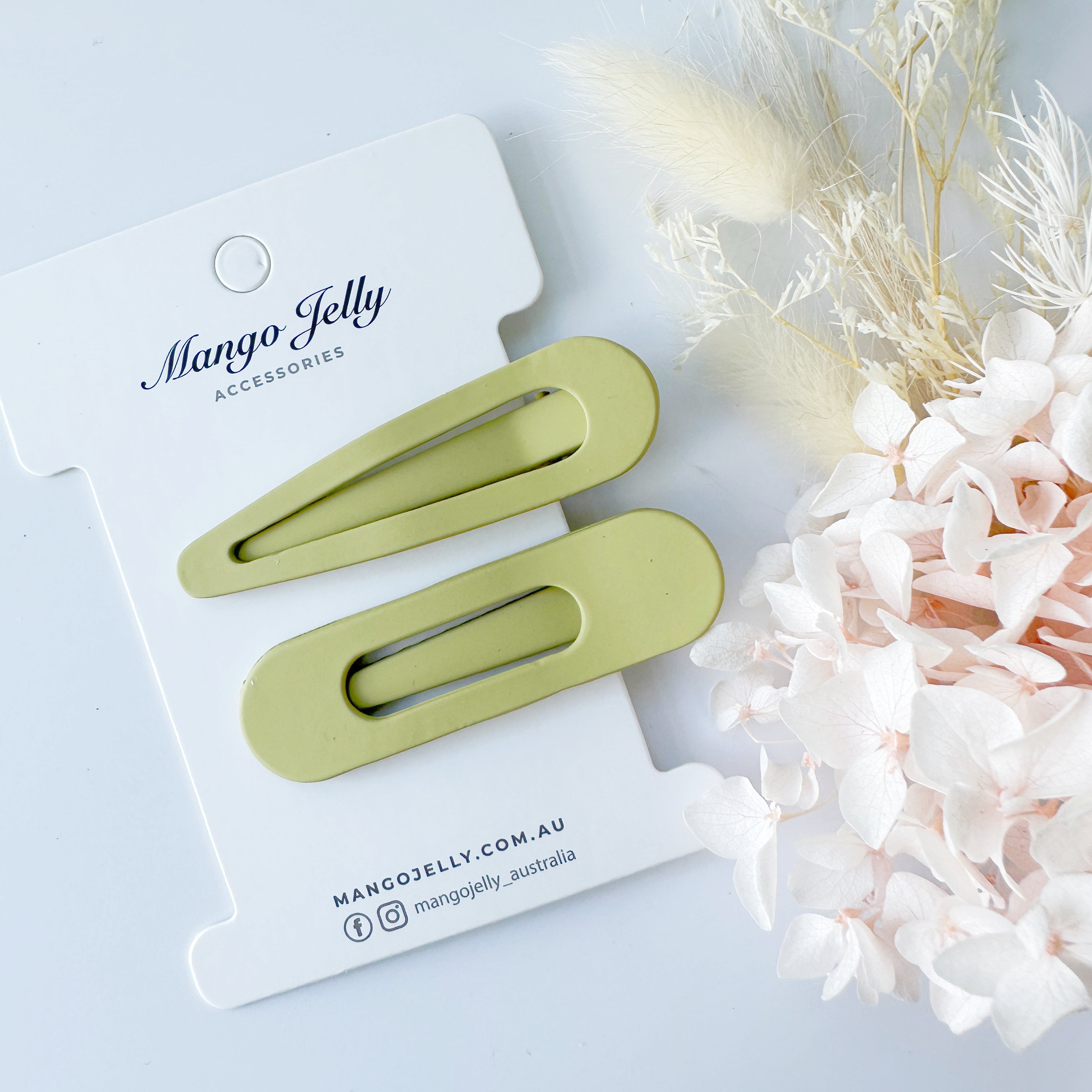 V659-HC-PASTELCOATED-ALI-AVOCADO-2-L-160769-00 MANGO JELLY Large Pastel Coated Hair Clips - Avocado - Twin Pack - Image 1