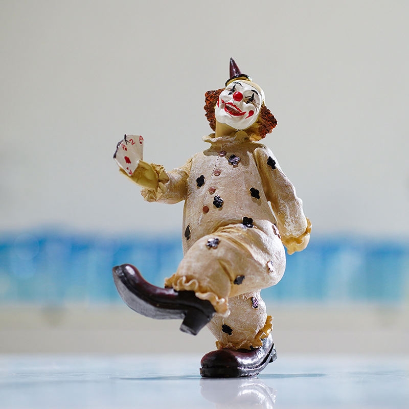 V888-ELOSUNG12462-211800-00 Vintage Circus Clown Figurines - Retro Balloon and Bicycle Ornaments - Image 1