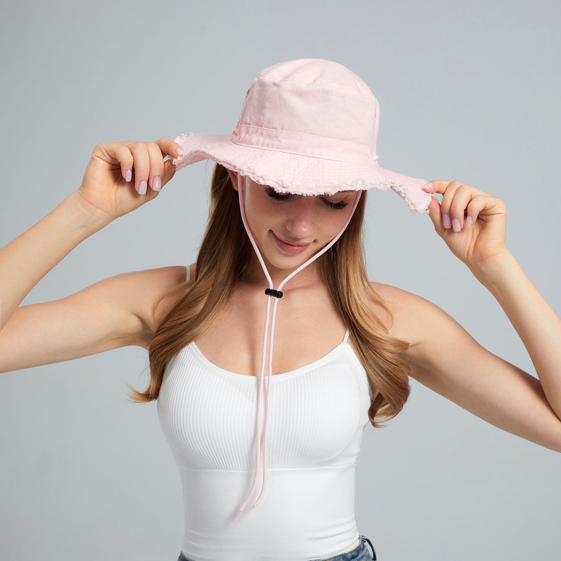 V888-ELOSUNG23652-202504141659-00 Pink Packable Cotton Bucket Hat - Folds into Wearable Pouch | Frayed Edge Sun Hat with Chin Strap - Image 1
